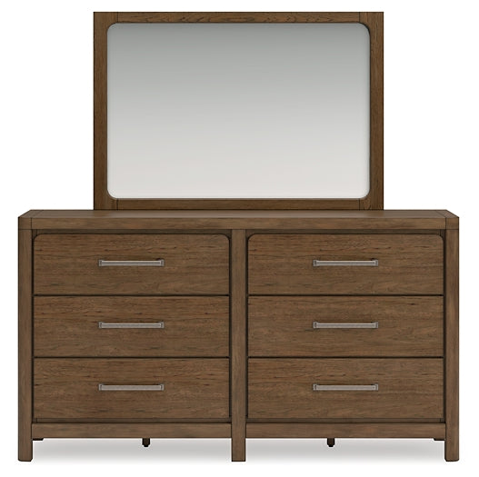 Cabalynn California King Upholstered Bed with Mirrored Dresser and Nightstand